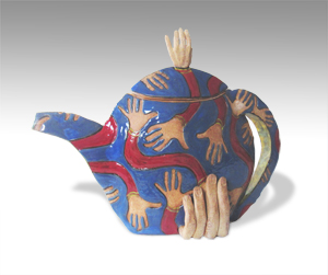 narrow teapot decorated with looped arms and hands