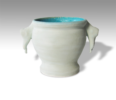 footed cup with tiny feet as handles