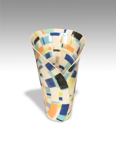 multicolor geometrically printed vase created with a wrapped circular slab