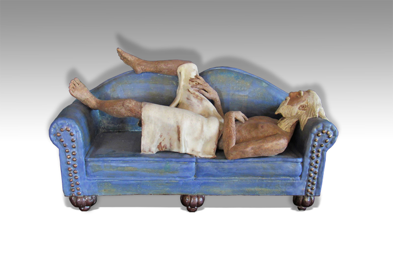 god lanquishing on a sofa with one leg resting on the sofa back