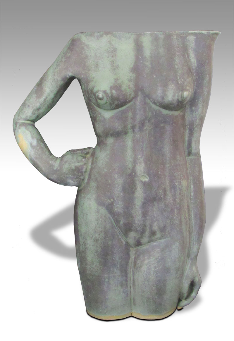 stylized female torso with arm as handle and shoulder-height spout