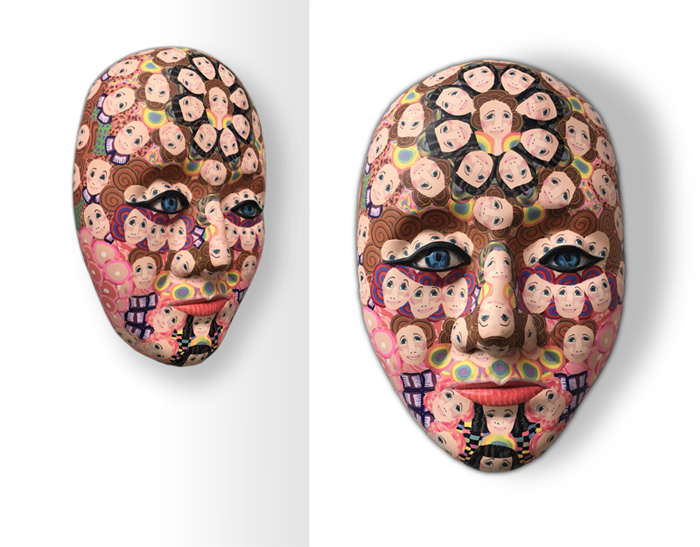 face sculpture covered with tiny female faces